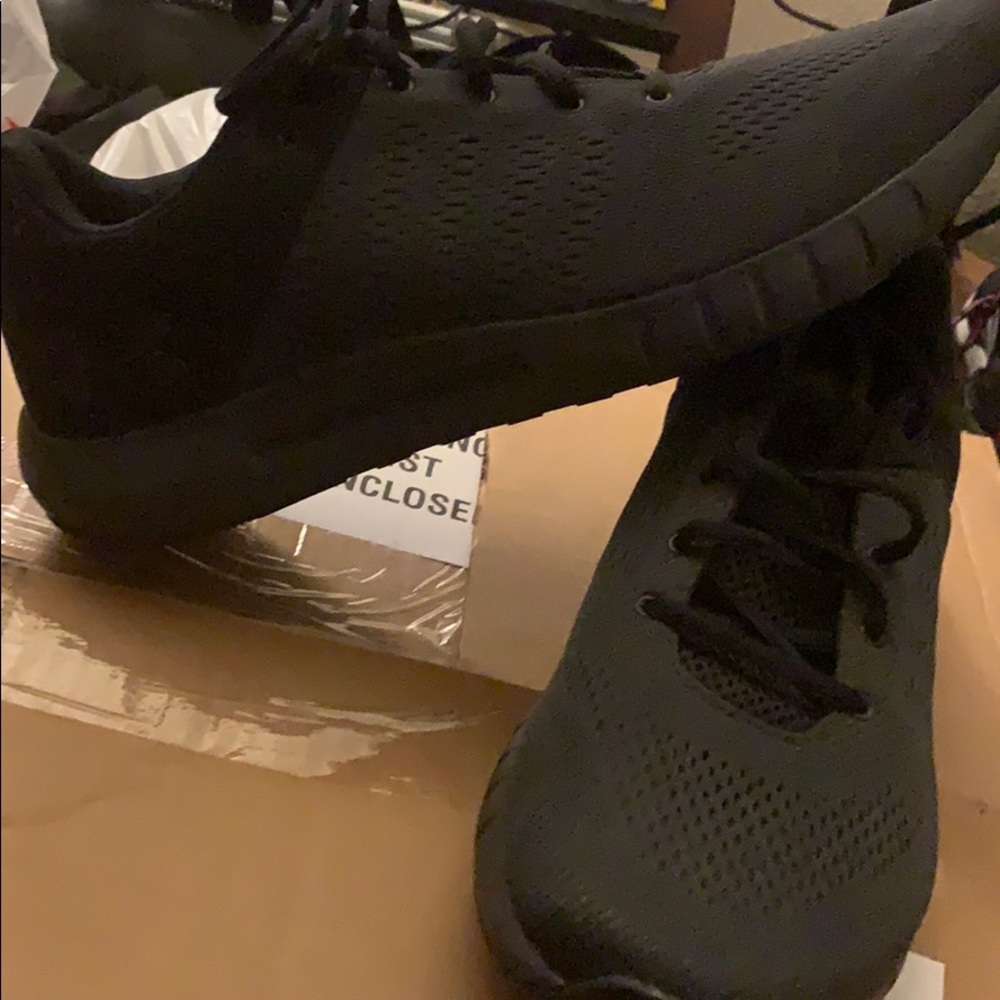 Pair of Under Armour shoes  size 11.5